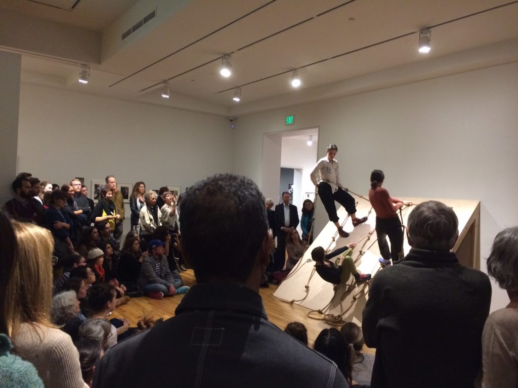 Students in Forti's Slant Board, at the opening of Radical Bodies exhibit, photo by WP